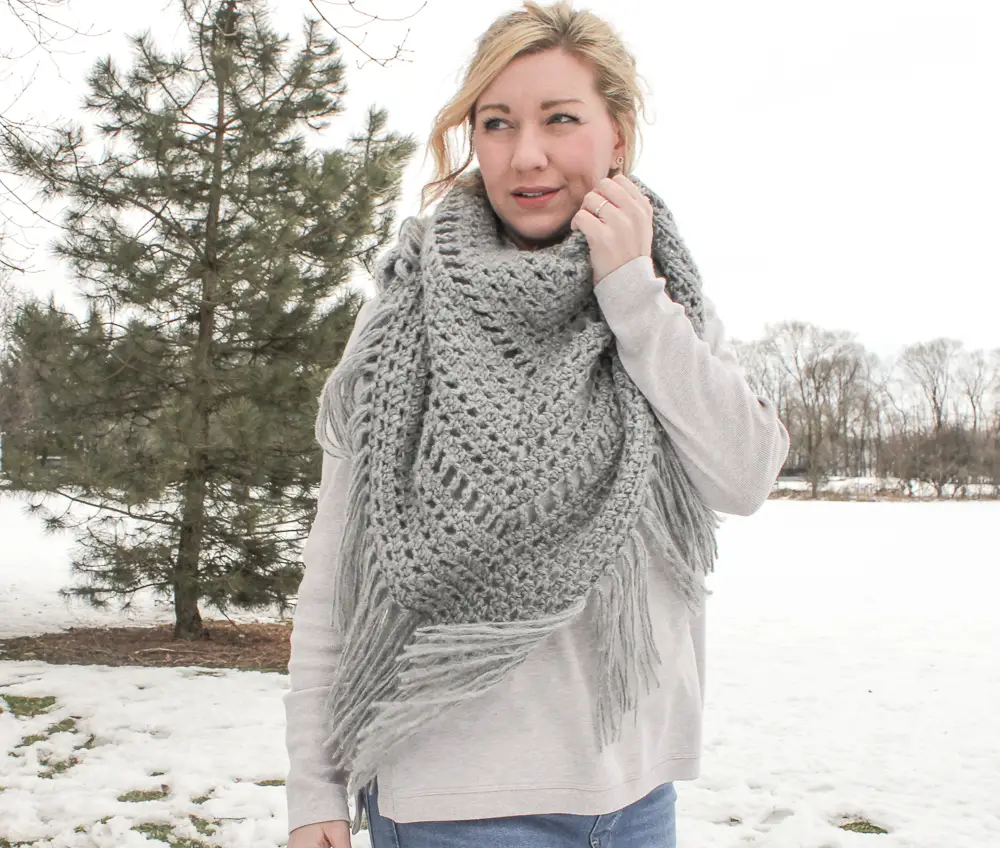 Free crochet pattern for a Triangle Scarf or wrap with fringe using Red Heart Dreamy Yarn.