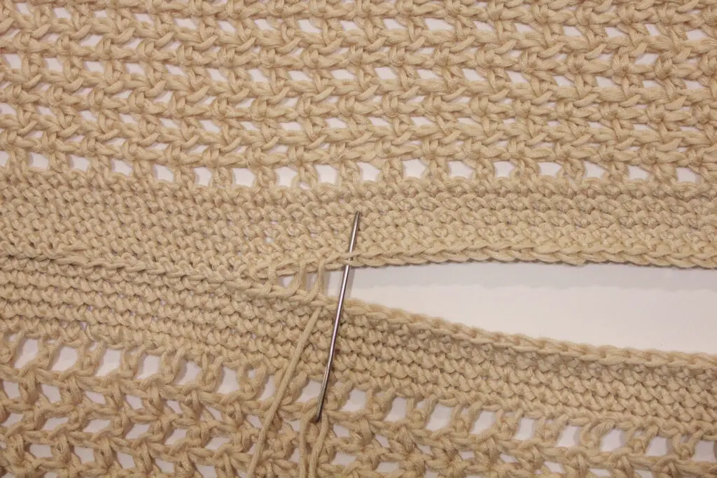 Use the mattress stitch to sew the two panels together.
