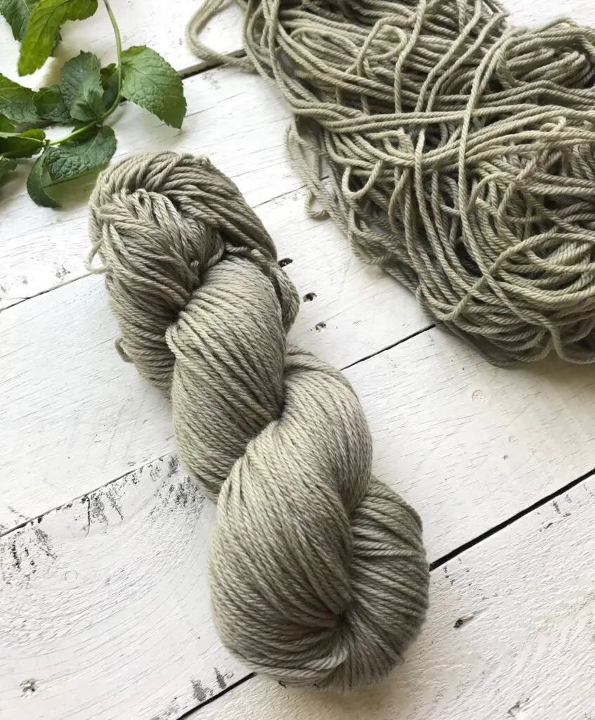 sage green yarn dyed with mint