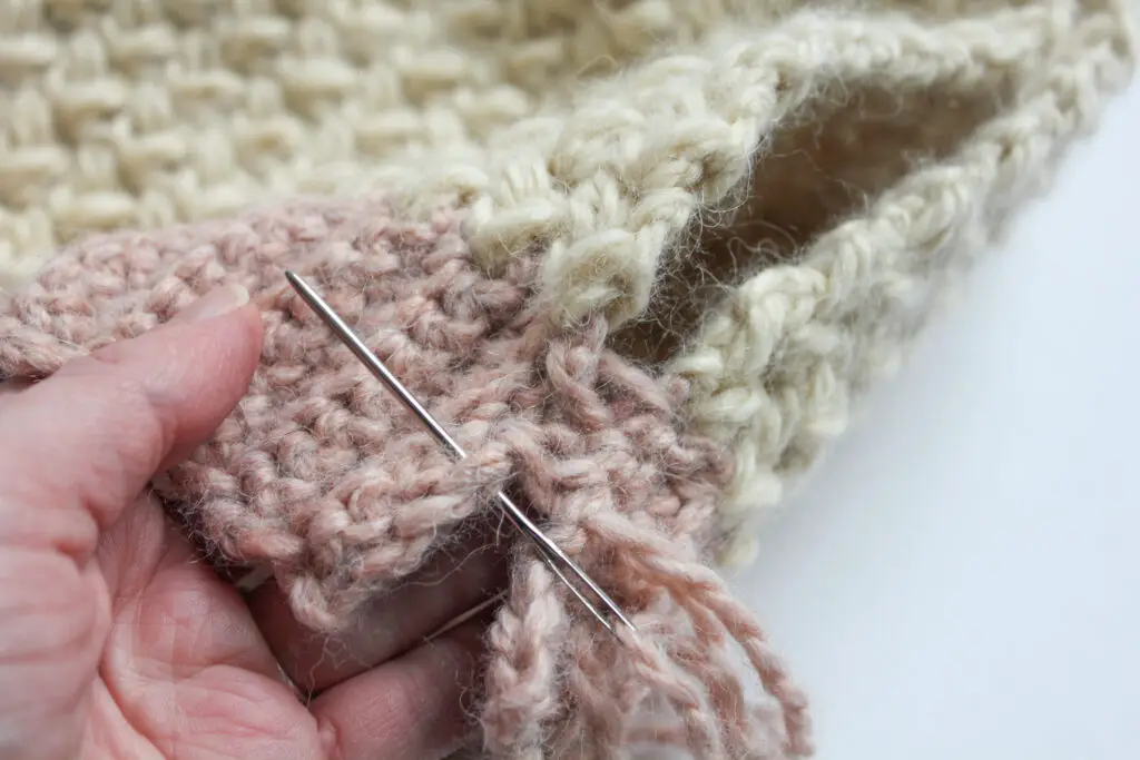 Use the mattress stitch to sew brim ends together