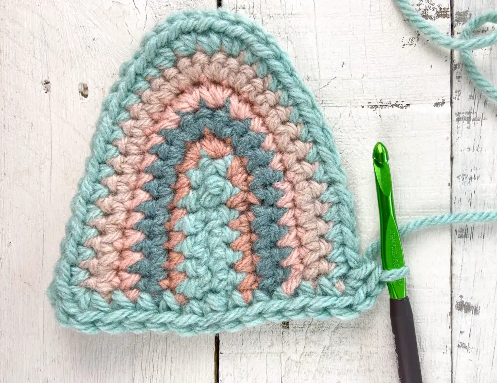 Row 6 of crochet baby blanket rainbow square.