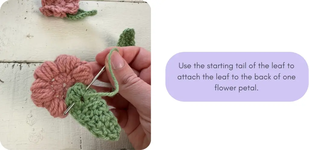 attaching a crochet leaf to a crochet flower